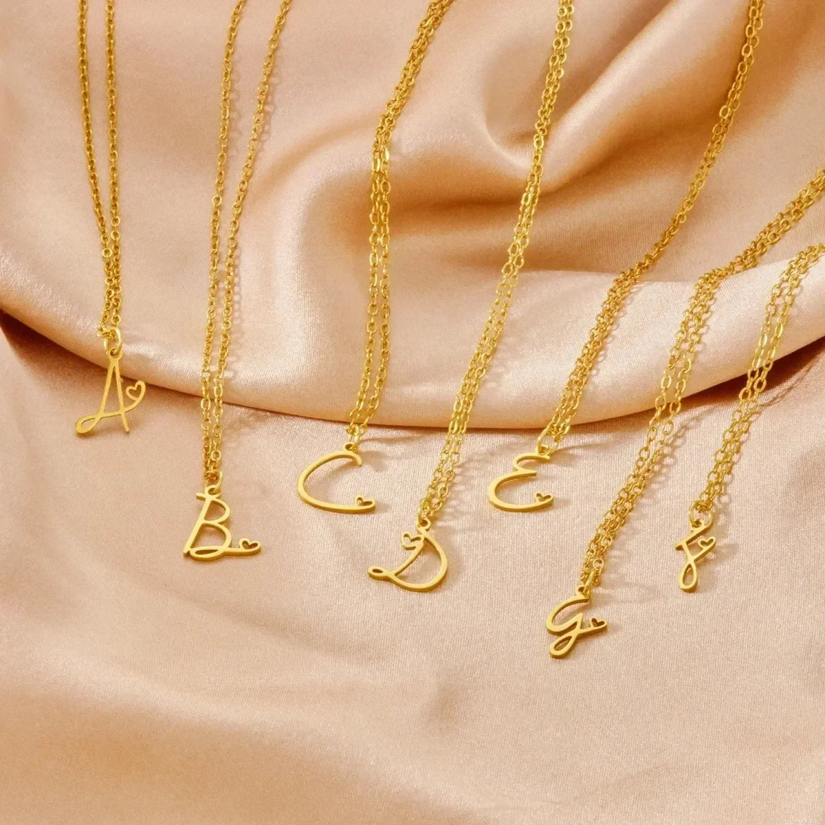 LUMISSORA Celestial Initial Heart Pendant (18K Gold Plated & Waterproof Steel)